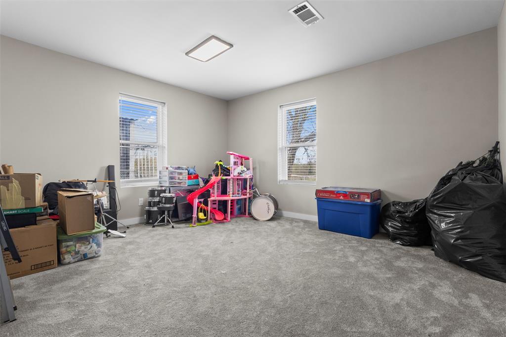 145 Lawson Road Mesquite, TX 75181 - Photo 18 of 31 a view of a room with gym equipment