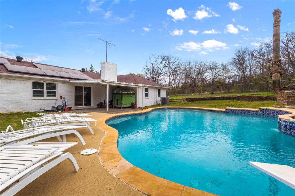 145 Lawson Road Mesquite, TX 75181 - Photo 20 of 31 a view of a house with swimming pool