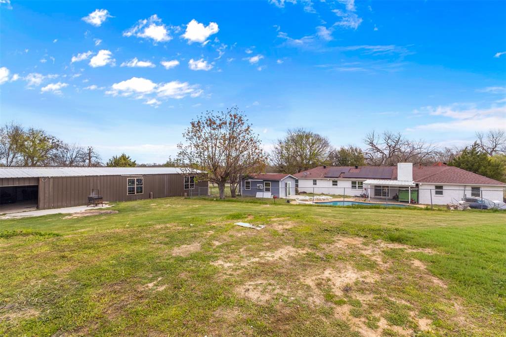 145 Lawson Road Mesquite, TX 75181 - Photo 24 of 31 a view of a house with a big yard