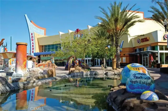 a view of swimming pool with outdoor seating