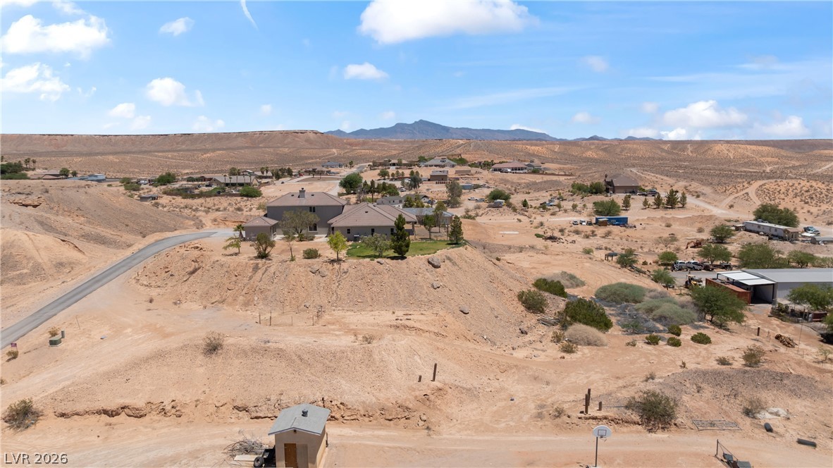 575 Gann Avenue Logandale, NV 89021 - Photo 73 of 75 Perched on a desert hill, this home offers distant mountain views and tranquil surroundings.
