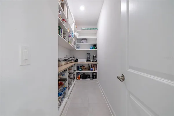 an aerial view of a house with a lake view