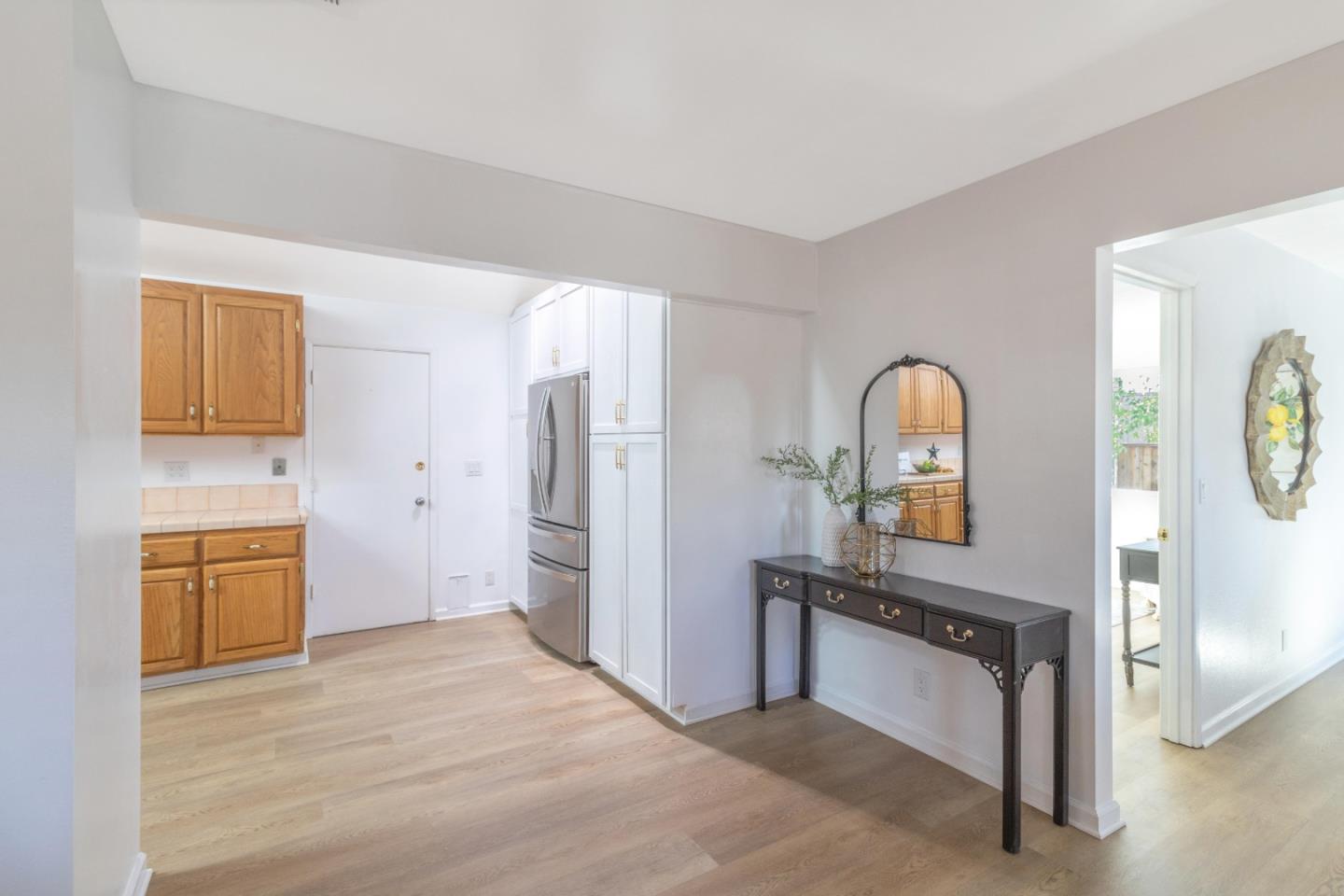 2319 Cimarron Drive Santa Clara, CA 95051 - Photo 11 of 42 a view of a bathroom with sink mirror and window