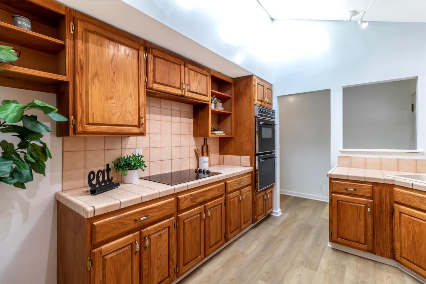 2319 Cimarron Drive Santa Clara, CA 95051 - Photo 13 of 42 a kitchen that has a sink and cabinets