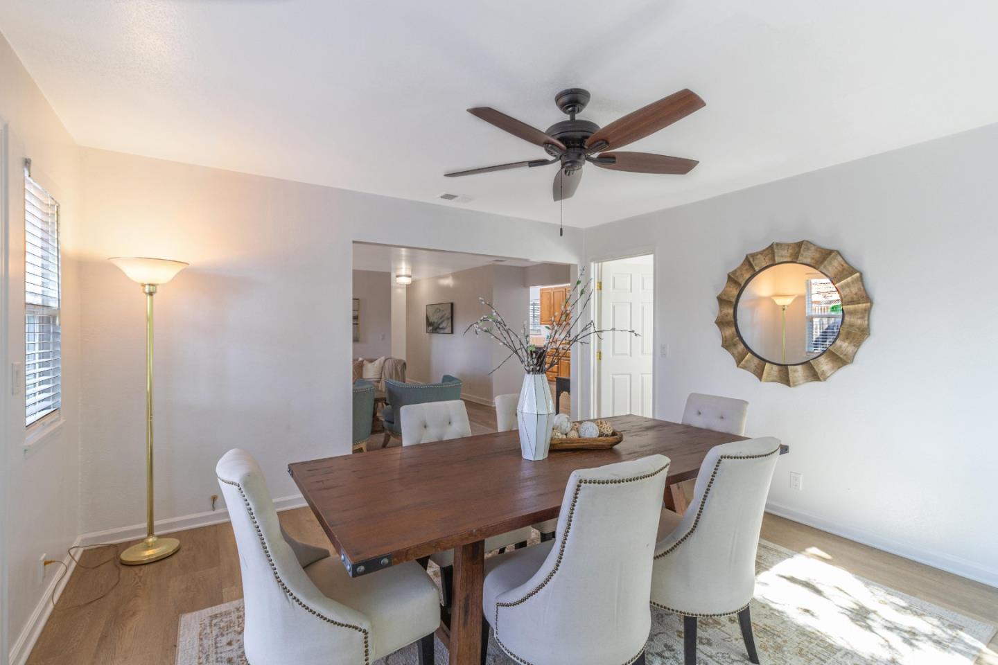 2319 Cimarron Drive Santa Clara, CA 95051 - Photo 16 of 42 a view of a dining room with furniture and a chandelier