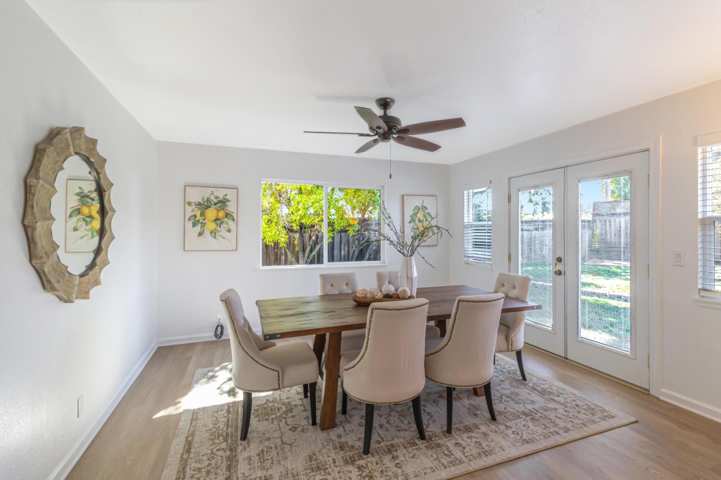 2319 Cimarron Drive Santa Clara, CA 95051 - Photo 17 of 42 a view of a dining room with furniture window and wooden floor