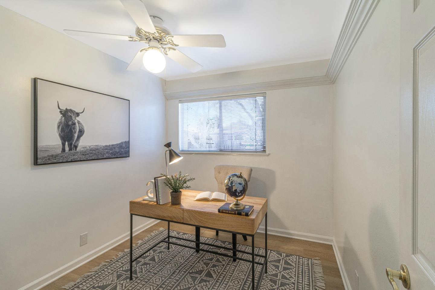 2319 Cimarron Drive Santa Clara, CA 95051 - Photo 18 of 42 a view of a workspace with furniture and a window