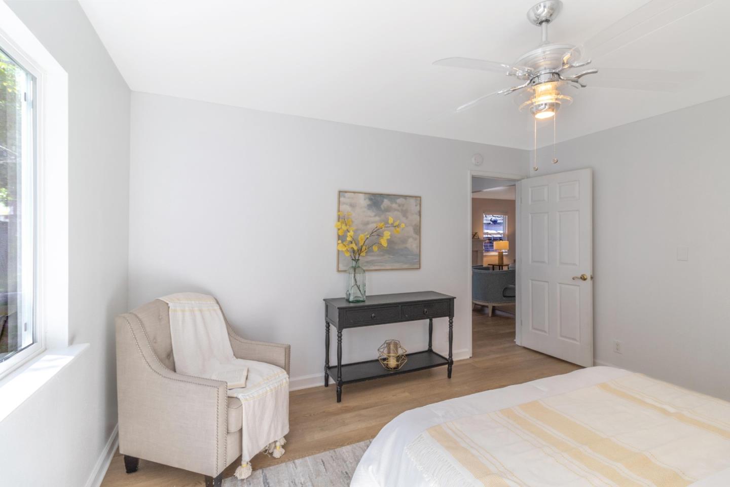 2319 Cimarron Drive Santa Clara, CA 95051 - Photo 29 of 42 a bedroom with a bed and a chair