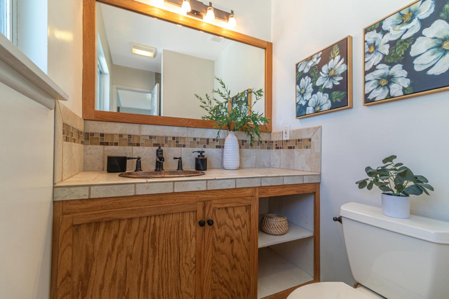2319 Cimarron Drive Santa Clara, CA 95051 - Photo 30 of 42 a bathroom with a toilet a sink and mirror
