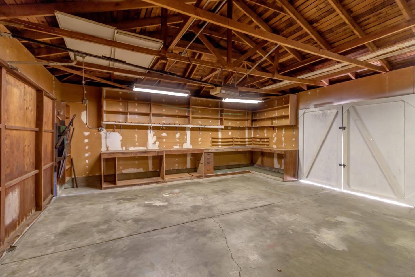 2319 Cimarron Drive Santa Clara, CA 95051 - Photo 34 of 42 a view of an empty room with a garage