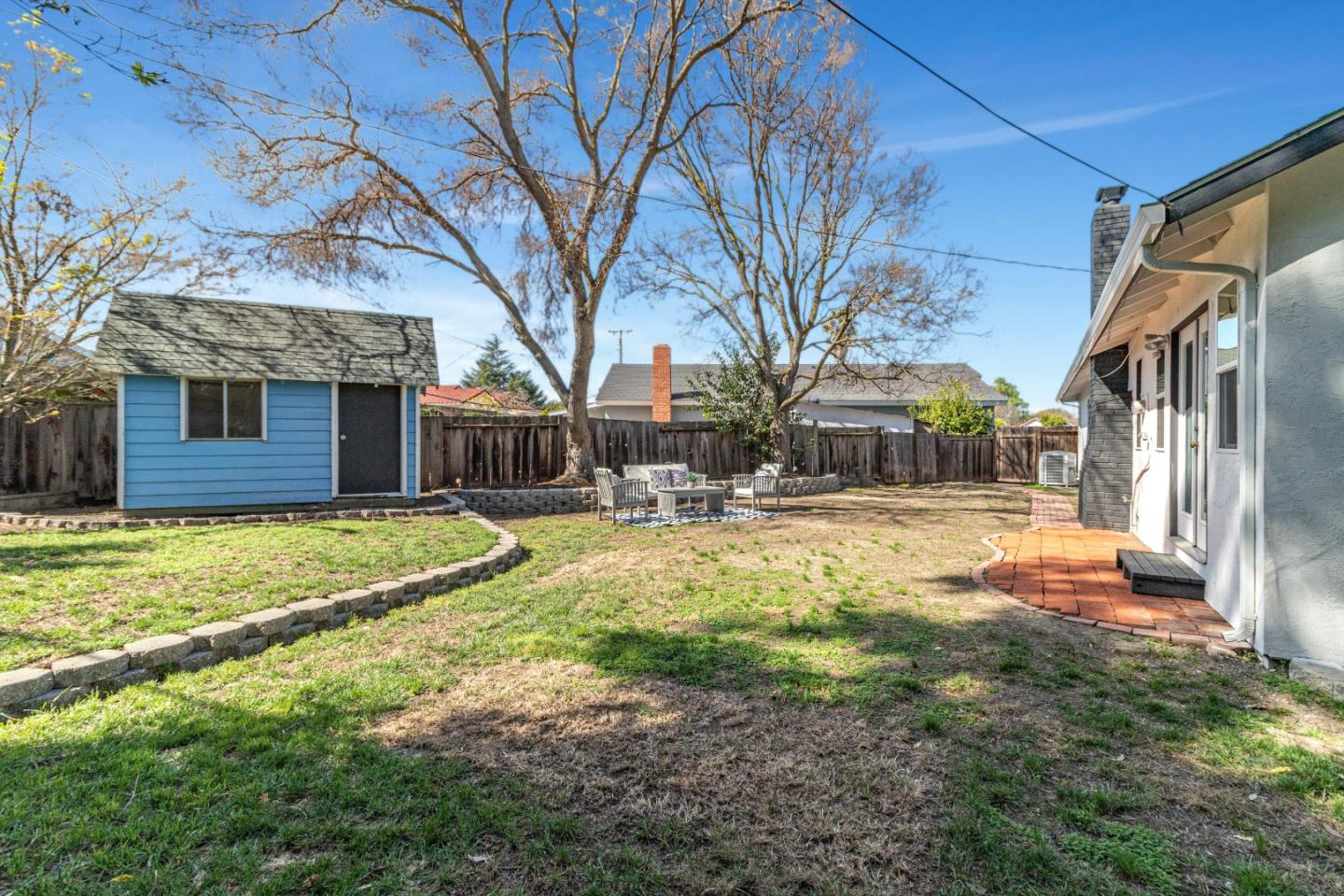 2319 Cimarron Drive Santa Clara, CA 95051 - Photo 38 of 42 a swimming pool with outdoor seating and yard