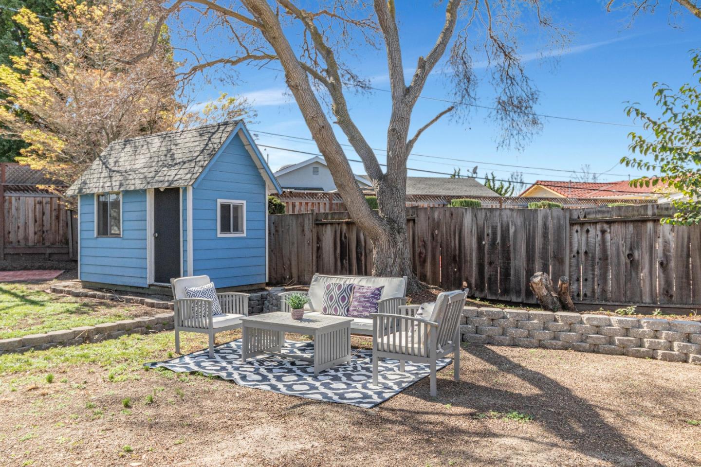 2319 Cimarron Drive Santa Clara, CA 95051 - Photo 41 of 42 a patio with table and chairs and potted plants