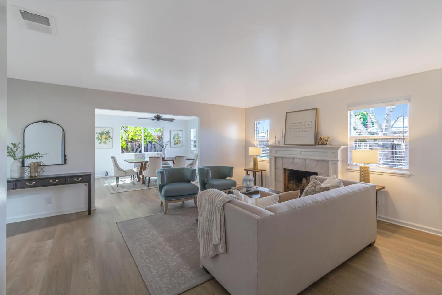 2319 Cimarron Drive Santa Clara, CA 95051 - Photo 8 of 42 a living room with furniture and a fireplace