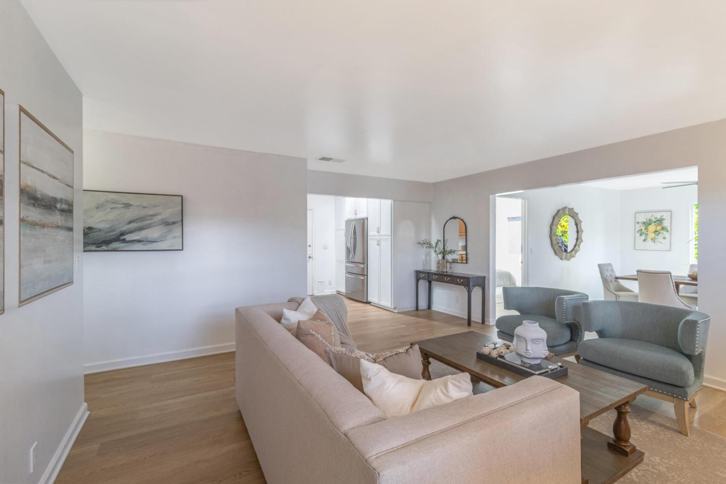 2319 Cimarron Drive Santa Clara, CA 95051 - Photo 9 of 42 a living room with furniture and a wooden floor