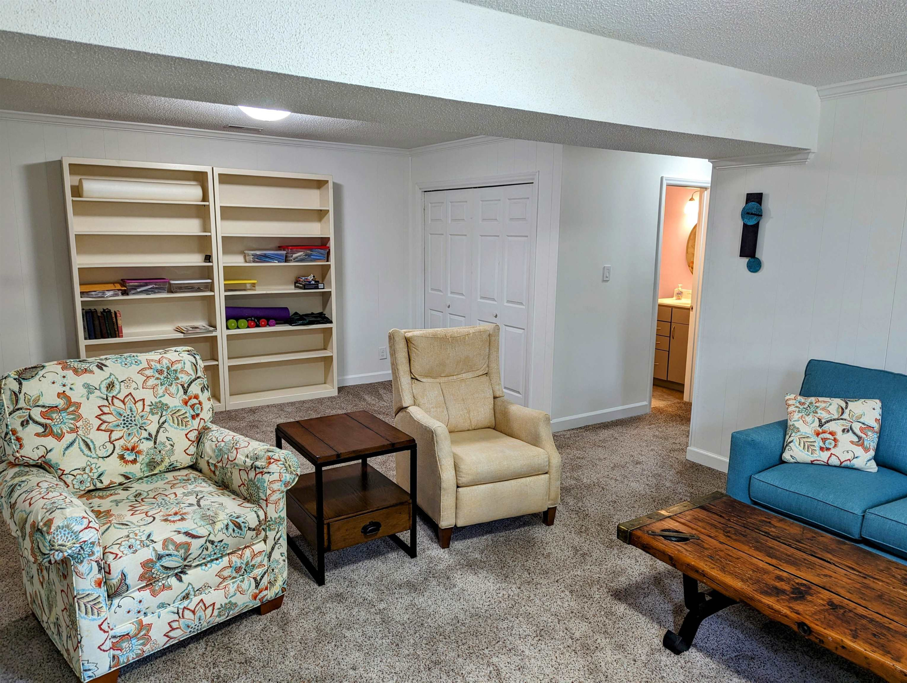 4503 Malvern Road Durham, NC 27707 - Photo 35 of 37 Family room offers plenty of room for TV watching and extra space for exercise equipment. Laundry closet is downstairs as well. Family Room