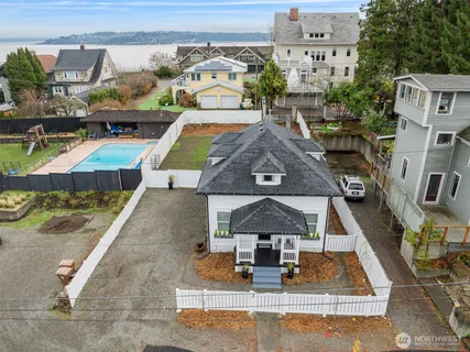 an aerial view of a house with swimming pool