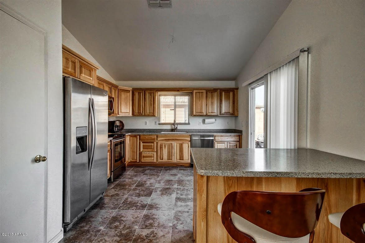 1810 West Renaissance Avenue Apache Junction, AZ 85120 - Photo 6 of 20 6 - Kitchen peninsula breakfast bar