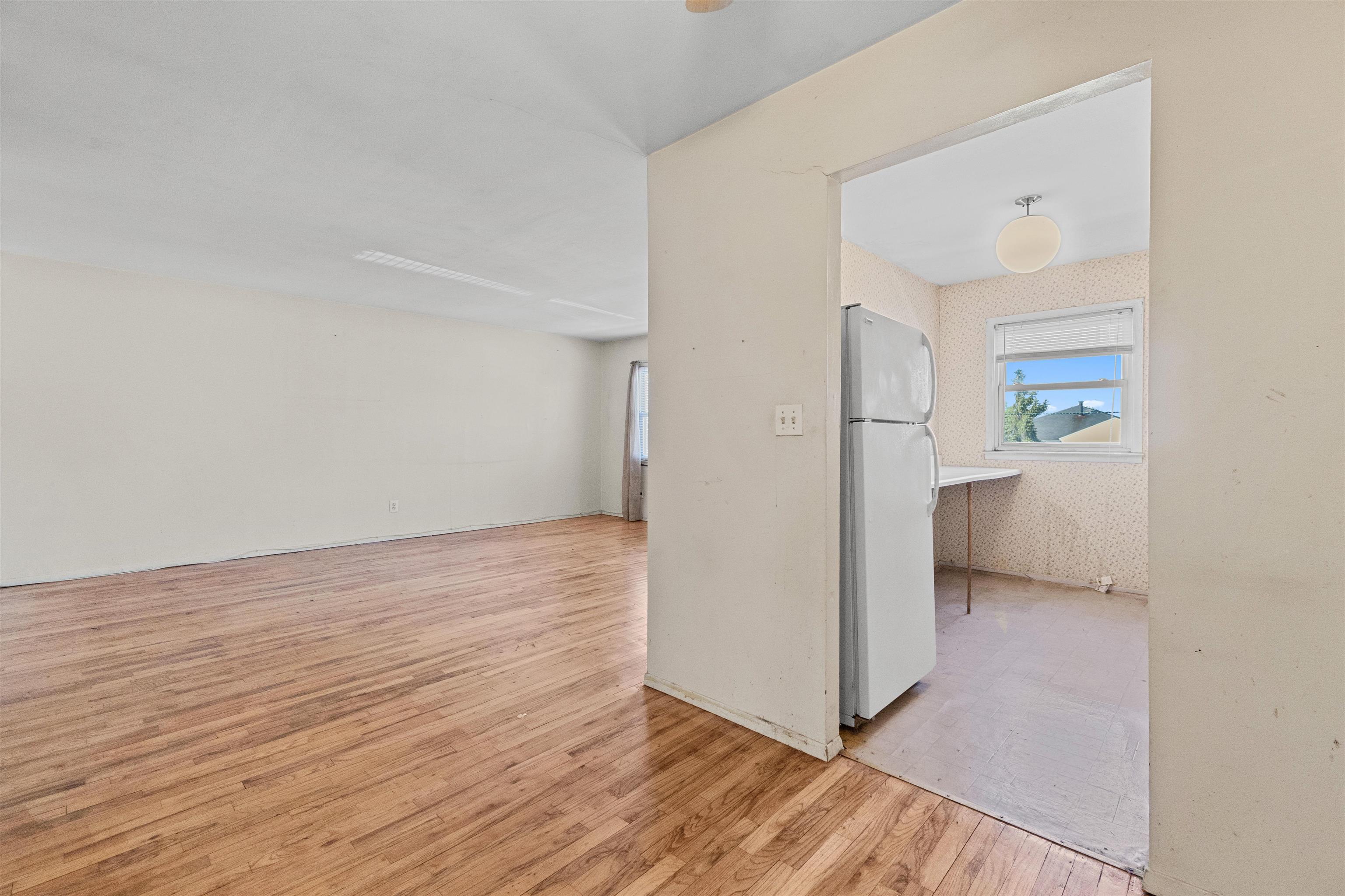 13 Crossgate Road Jersey City, NJ 07305 - Photo 17 of 36 a view of a room with wooden floor