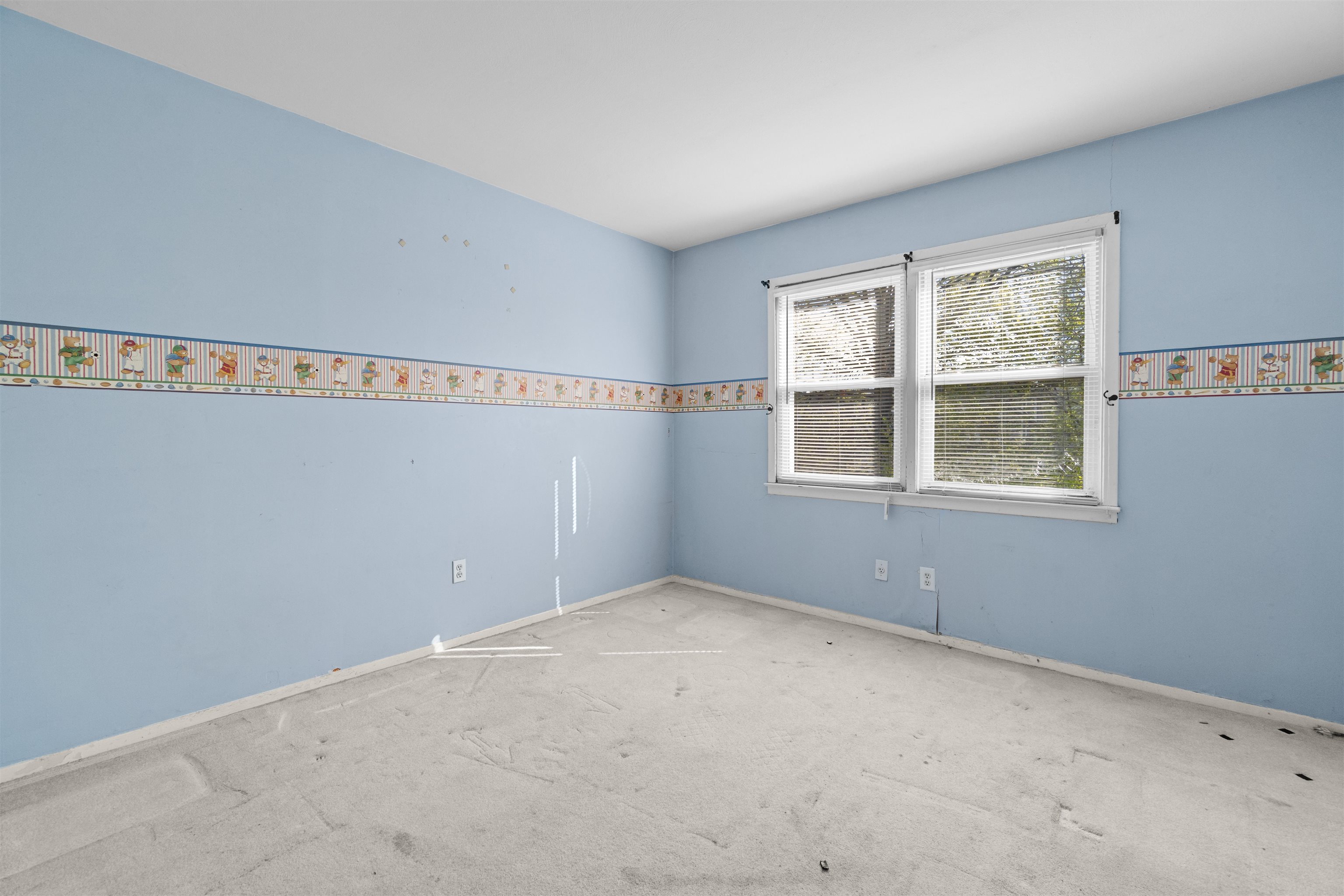 13 Crossgate Road Jersey City, NJ 07305 - Photo 19 of 36 a view of an empty room with a window