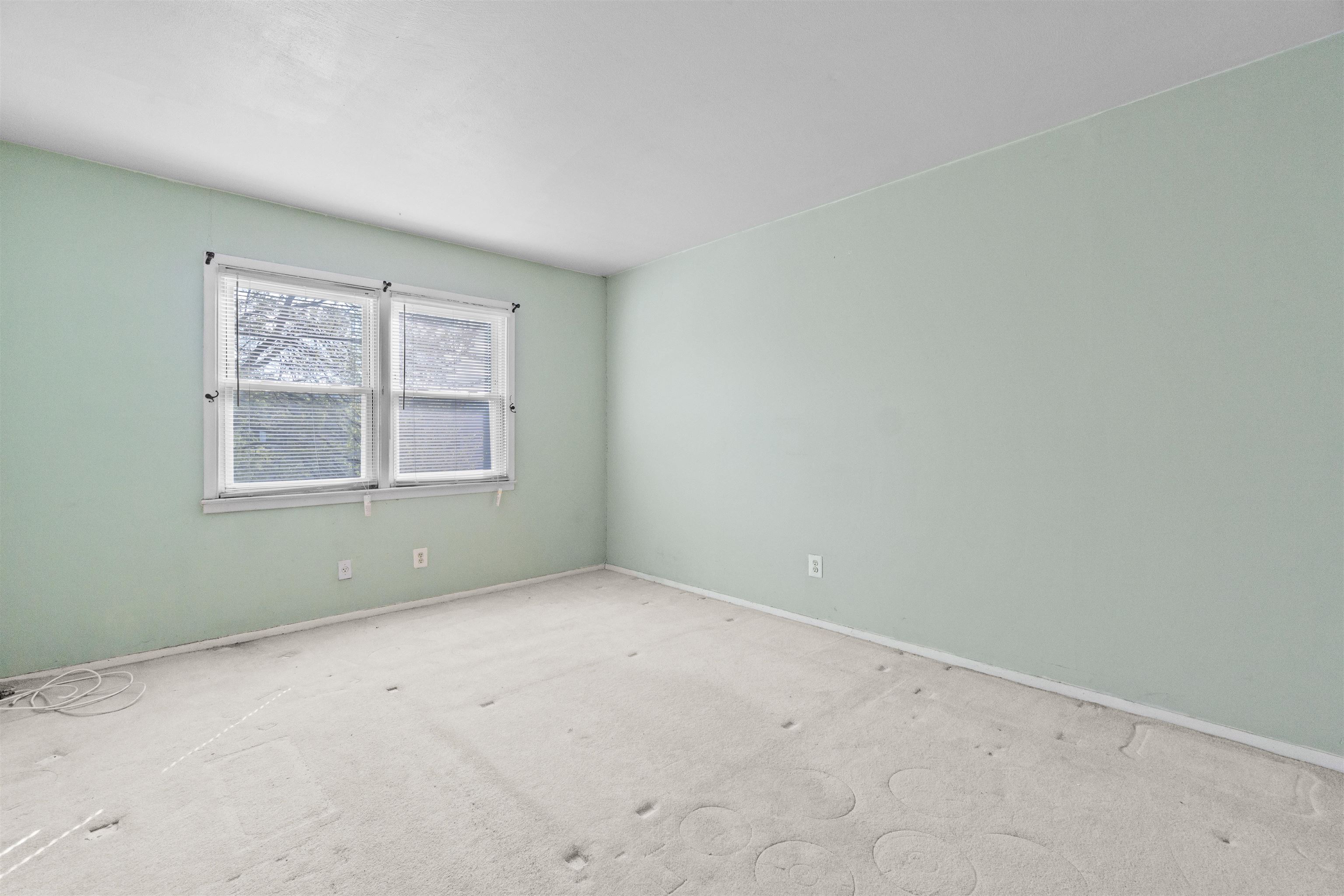 13 Crossgate Road Jersey City, NJ 07305 - Photo 21 of 36 an empty room with windows