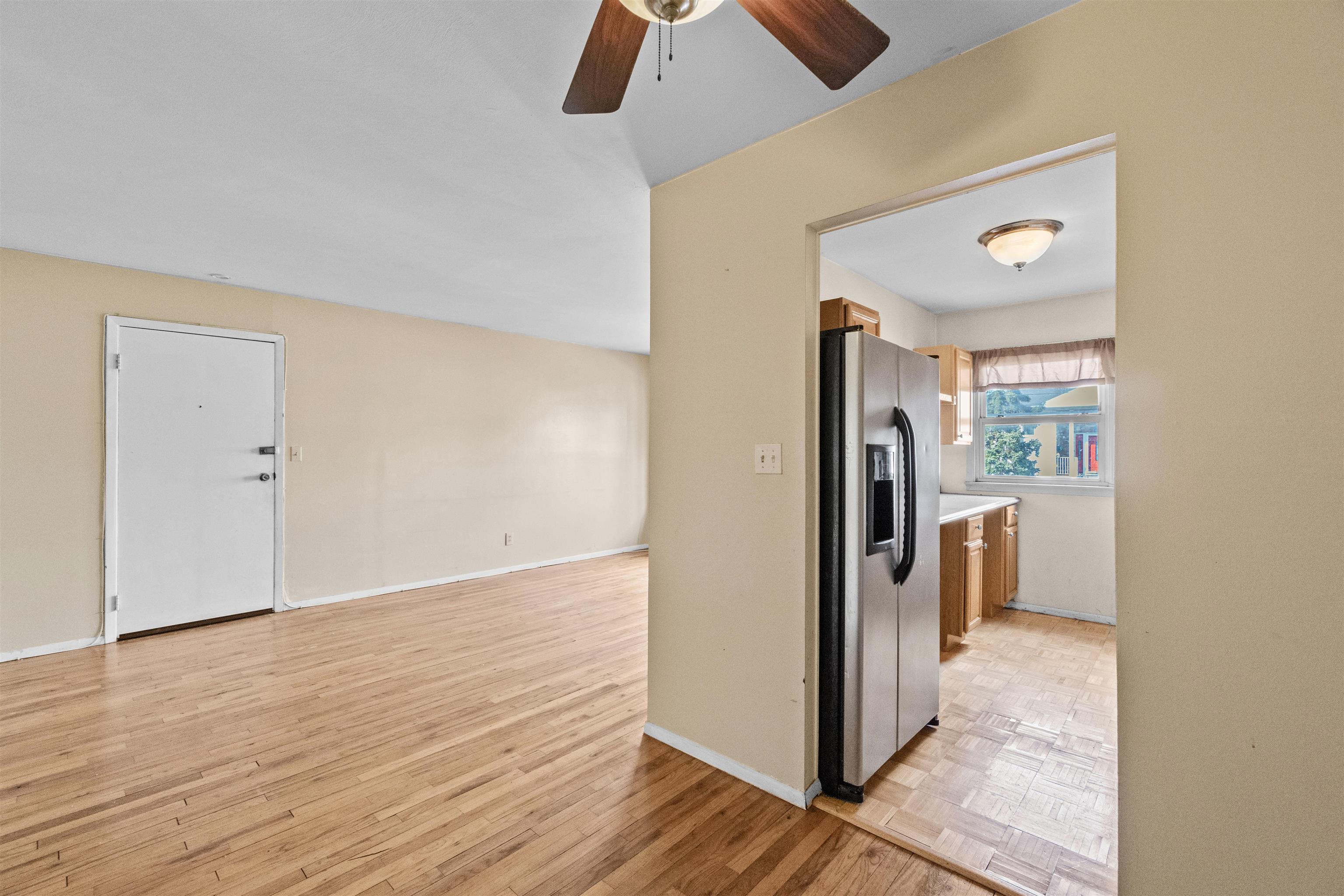 13 Crossgate Road Jersey City, NJ 07305 - Photo 4 of 36 a view of empty room with wooden floor