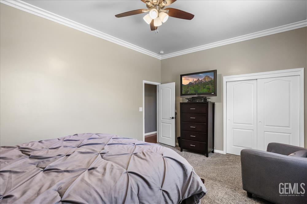 Undisclosed Address Tehachapi, CA 93561 - Photo 31 of 68 a bedroom with a bed and a couch