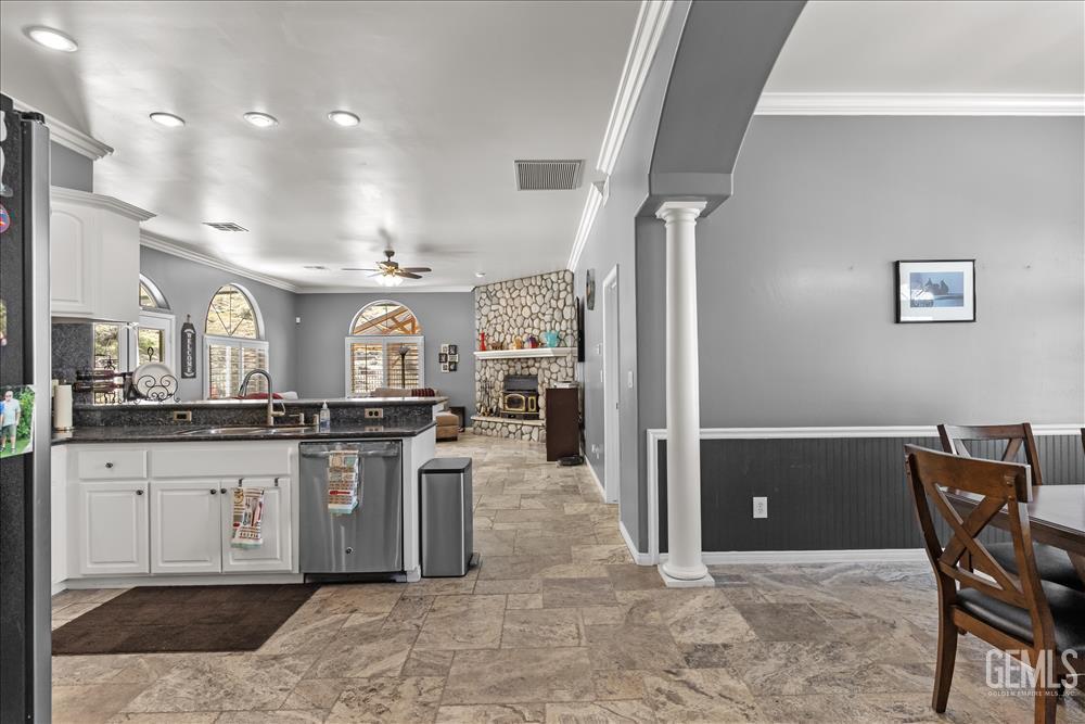 Undisclosed Address Tehachapi, CA 93561 - Photo 8 of 68 a kitchen with stainless steel appliances granite countertop a refrigerator and a sink