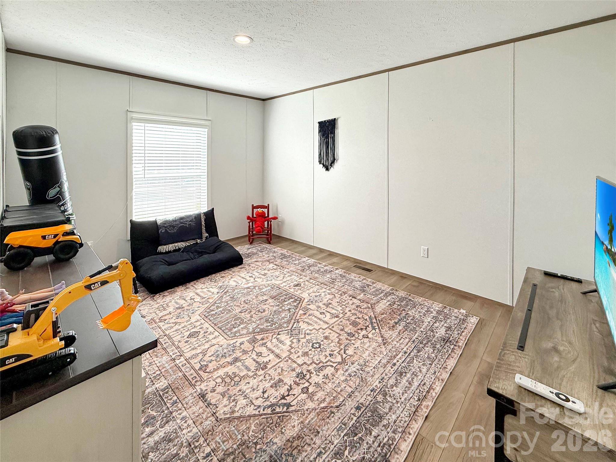 264 Fairchase Circle Stony Point, NC 28678 - Photo 20 of 24 a bedroom with furniture and a window