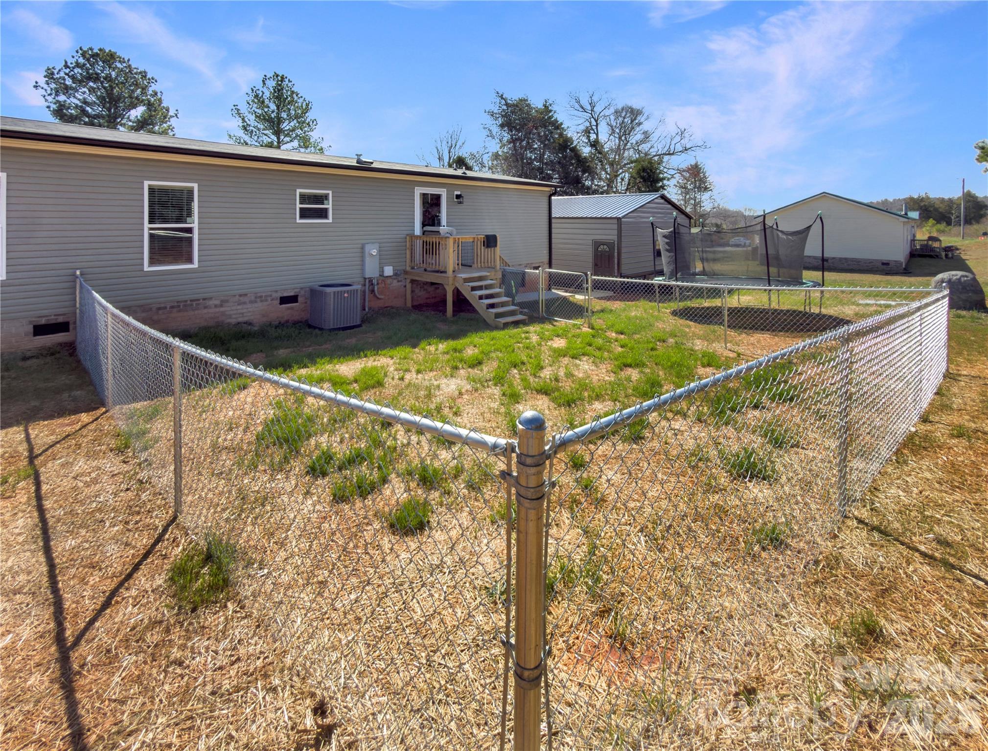 264 Fairchase Circle Stony Point, NC 28678 - Photo 23 of 24 a view of a house with pool and chairs