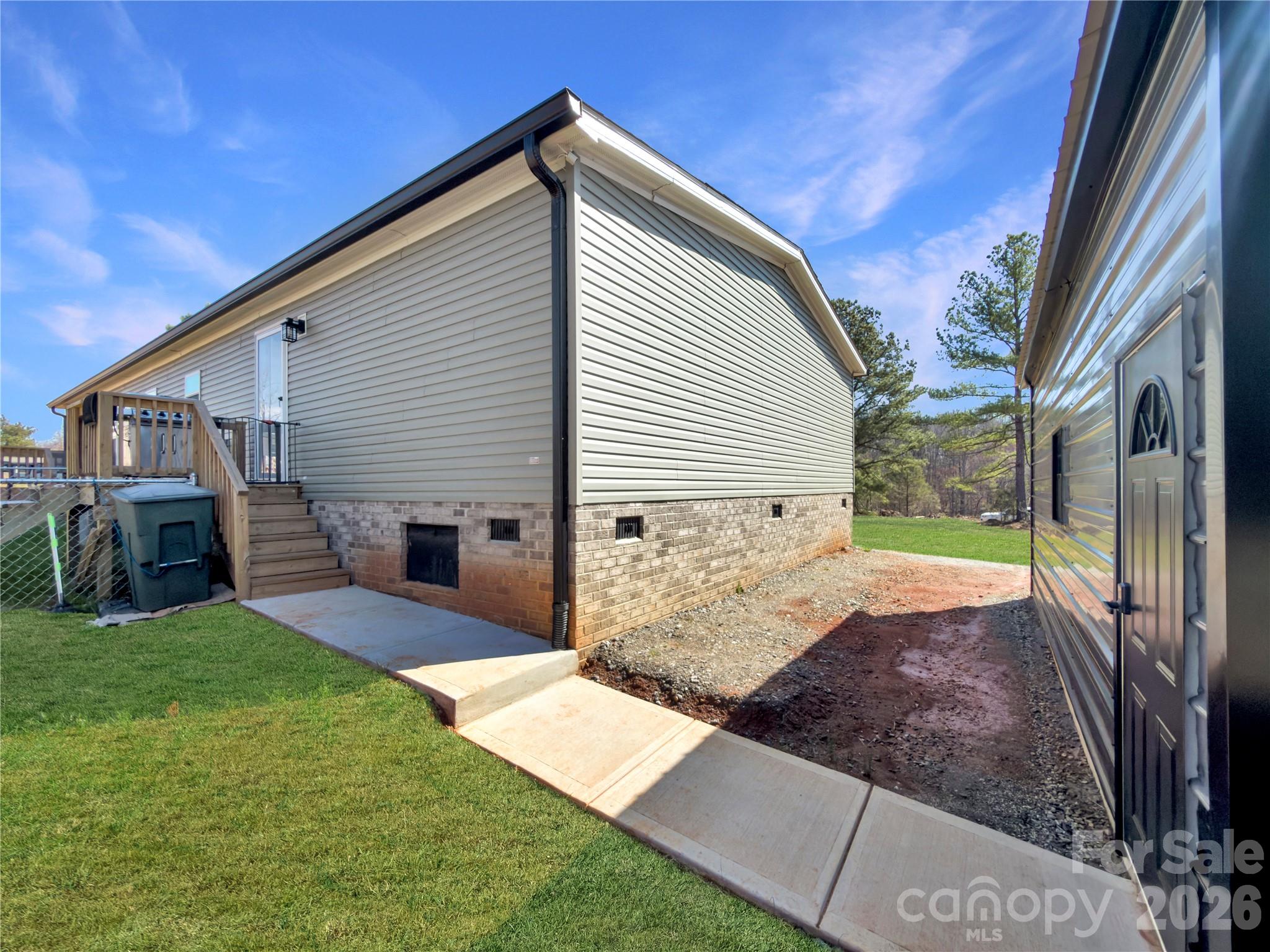 264 Fairchase Circle Stony Point, NC 28678 - Photo 24 of 24 a front view of a house with garden