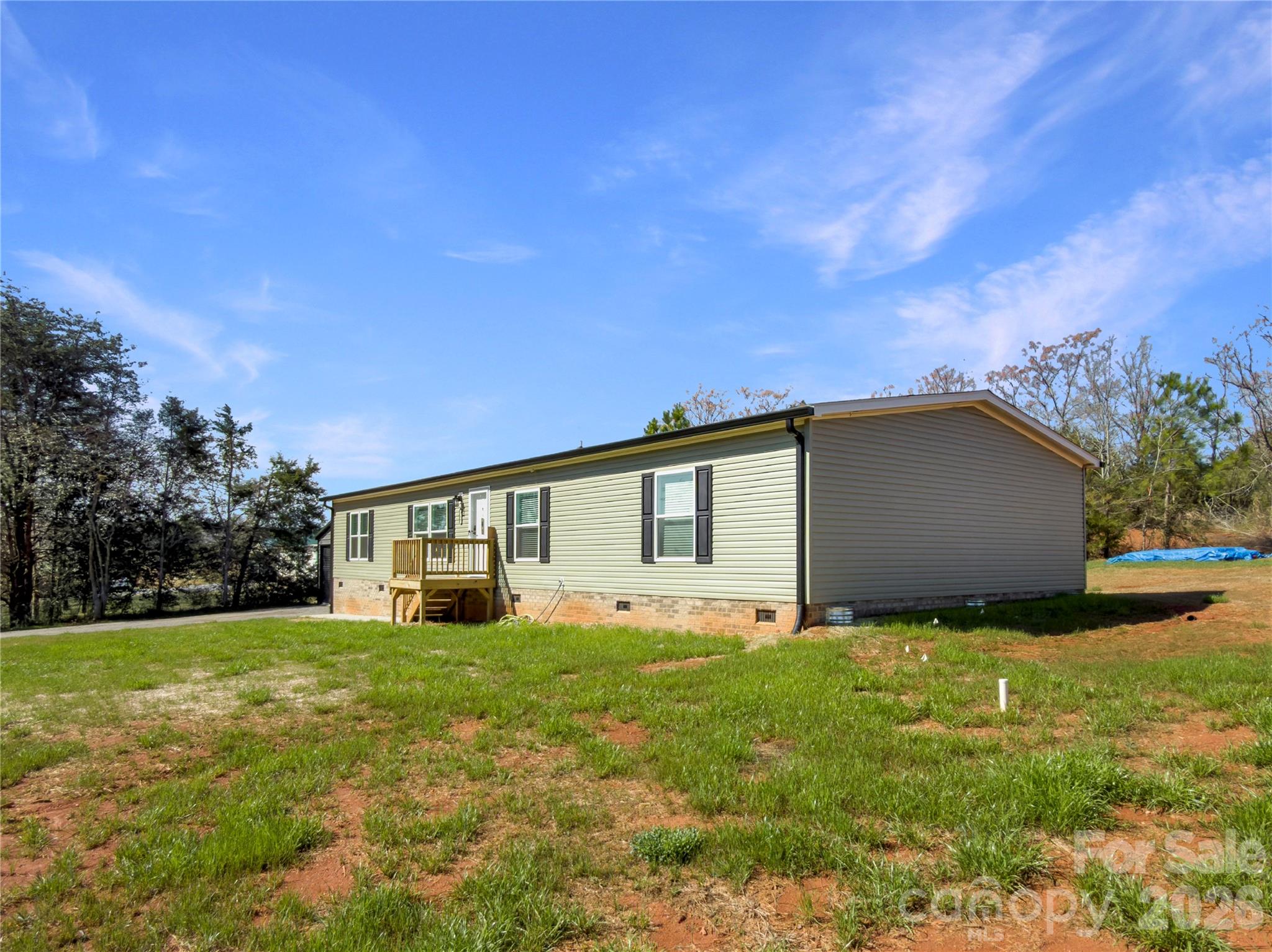 264 Fairchase Circle Stony Point, NC 28678 - Photo 4 of 24 a front view of house with yard and green space