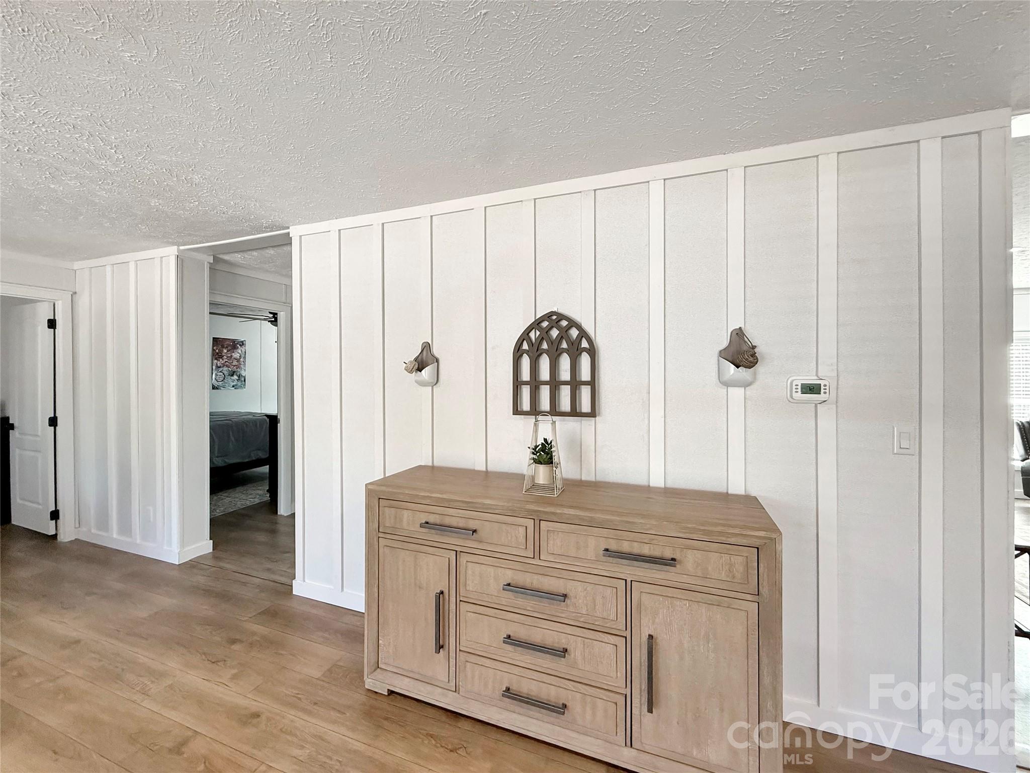 264 Fairchase Circle Stony Point, NC 28678 - Photo 10 of 24 a bathroom with a sink a mirror and a shower