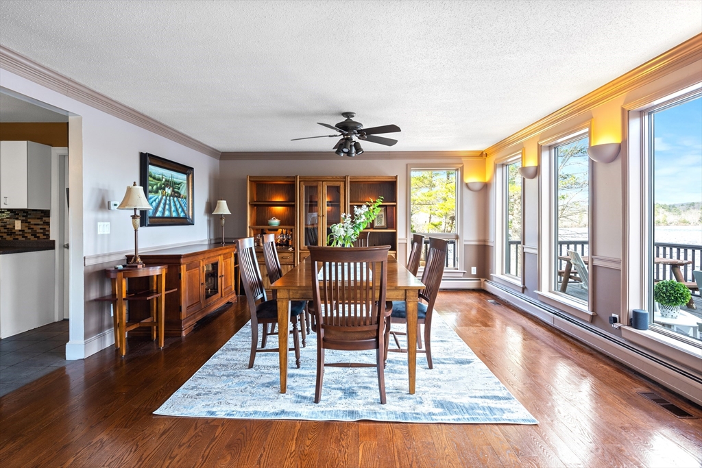 152 Kimball Road Amesbury, MA 01913 - Photo 5 of 20 a view of a dining room with furniture window and wooden floor