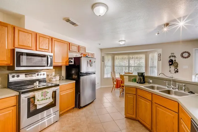 a view of living room with furniture and flat screen tv