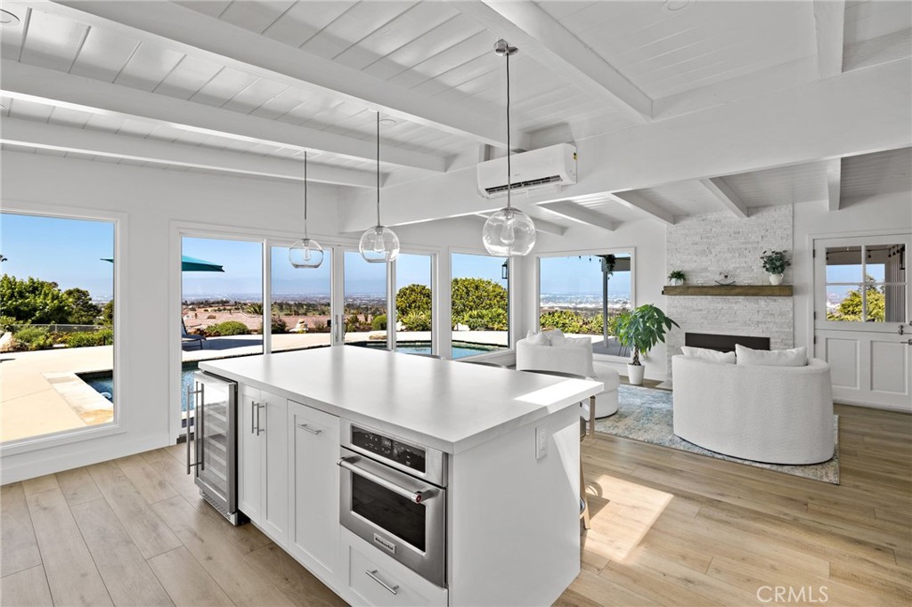 81 Rockinghorse Road Rancho Palos Verdes, CA 90275 - Photo 1 of 1 a kitchen with stainless steel appliances granite countertop a sink a stove and a wooden floors
