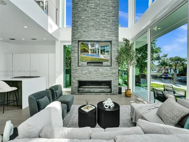 a view of yard with swimming pool and green space