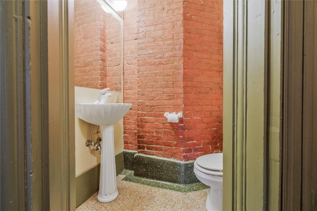 1 Pius Street, Unit B1 Pittsburgh, PA 15203 - Photo 36 of 45 a bathroom with a toilet and a shower