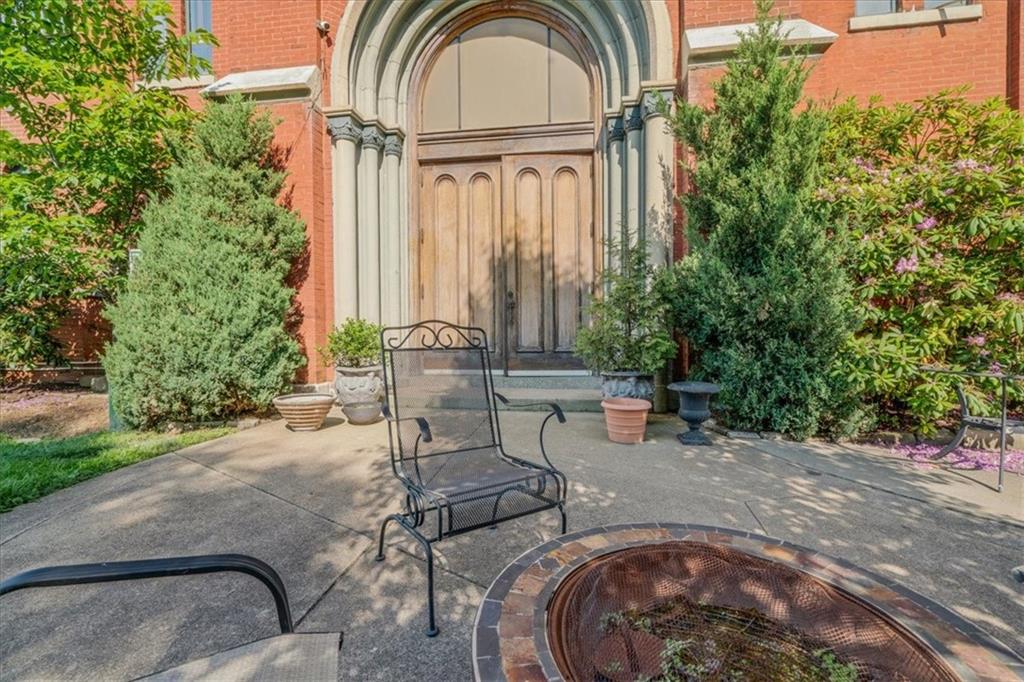 1 Pius Street, Unit B1 Pittsburgh, PA 15203 - Photo 40 of 45 a view of a chair and fire pit in backyard of the house