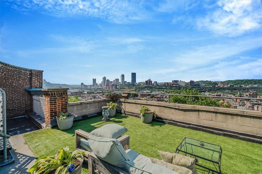 1 Pius Street, Unit B1 Pittsburgh, PA 15203 - Photo 43 of 45 a view of a terrace with couches and city view