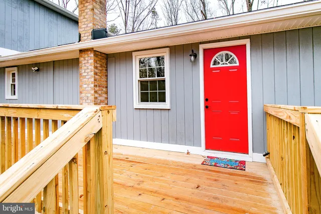a view of deck with a trees