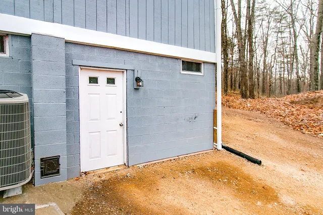 a house with trees in front of it