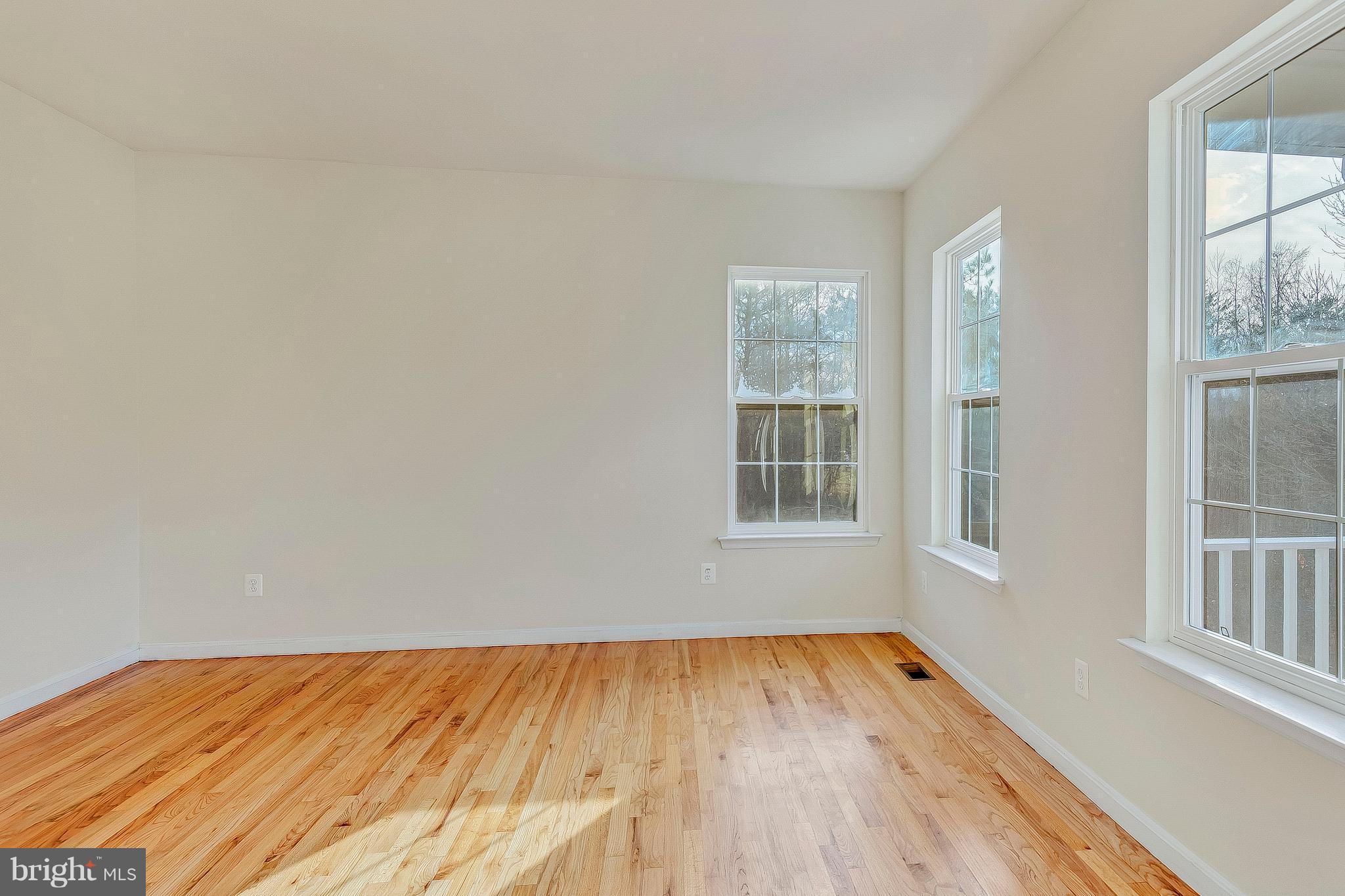4613 Green Ridge Court Huntingtown, MD 20639 - Photo 10 of 29 Separate living room with hardwood floors