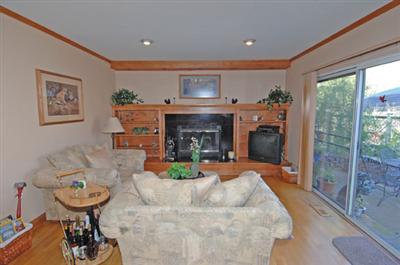 16 Hop Ranch Court Santa Rosa, CA 95403 - Photo 3 of 12 a living room with furniture and a fireplace