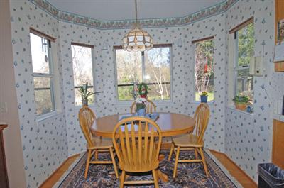 16 Hop Ranch Court Santa Rosa, CA 95403 - Photo 7 of 12 a view of a dining room with furniture window and outside view
