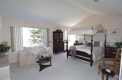 16 Hop Ranch Court Santa Rosa, CA 95403 - Photo 8 of 12 a bedroom with bed and window