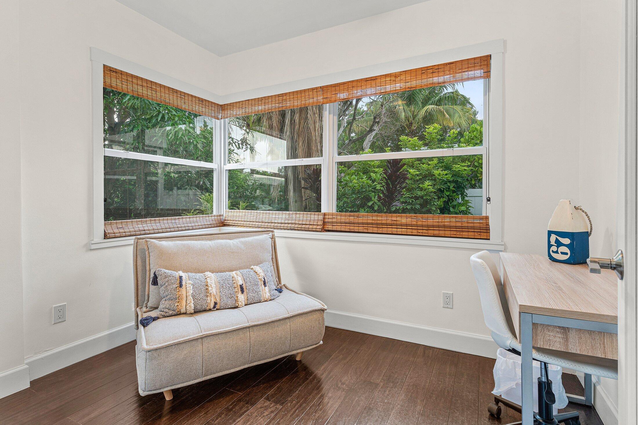 414 Northeast 7th Avenue Delray Beach, FL 33483 - Photo 11 of 29 a living room with furniture and a window