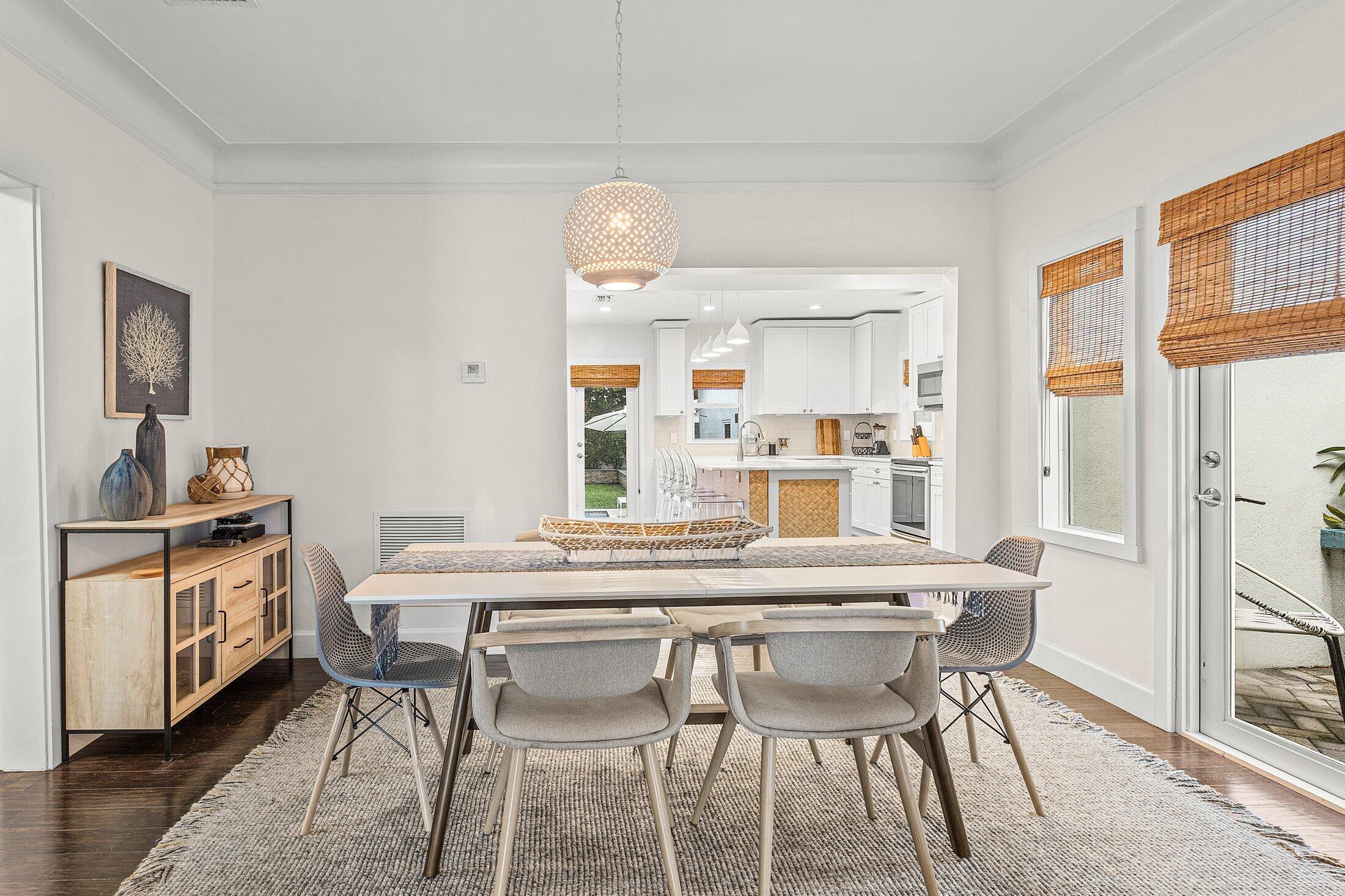 414 Northeast 7th Avenue Delray Beach, FL 33483 - Photo 8 of 29 a dining room with furniture and window