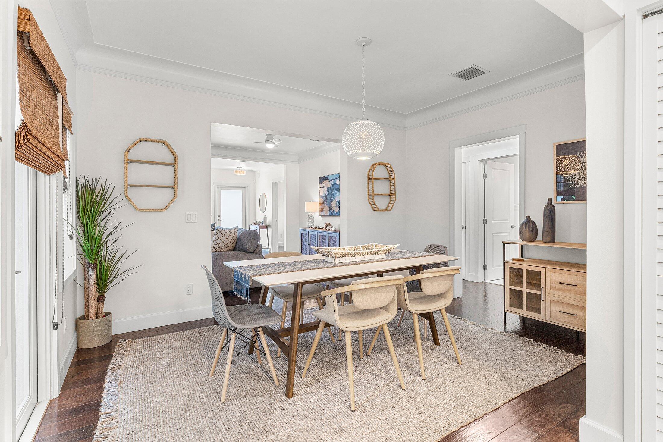 414 Northeast 7th Avenue Delray Beach, FL 33483 - Photo 9 of 29 a dining room with a table and chairs