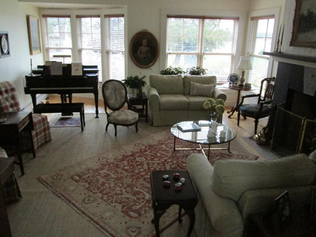 144 Perkins Street Castine, ME 04421 - Photo 9 of 21 The welcoming living room offers...