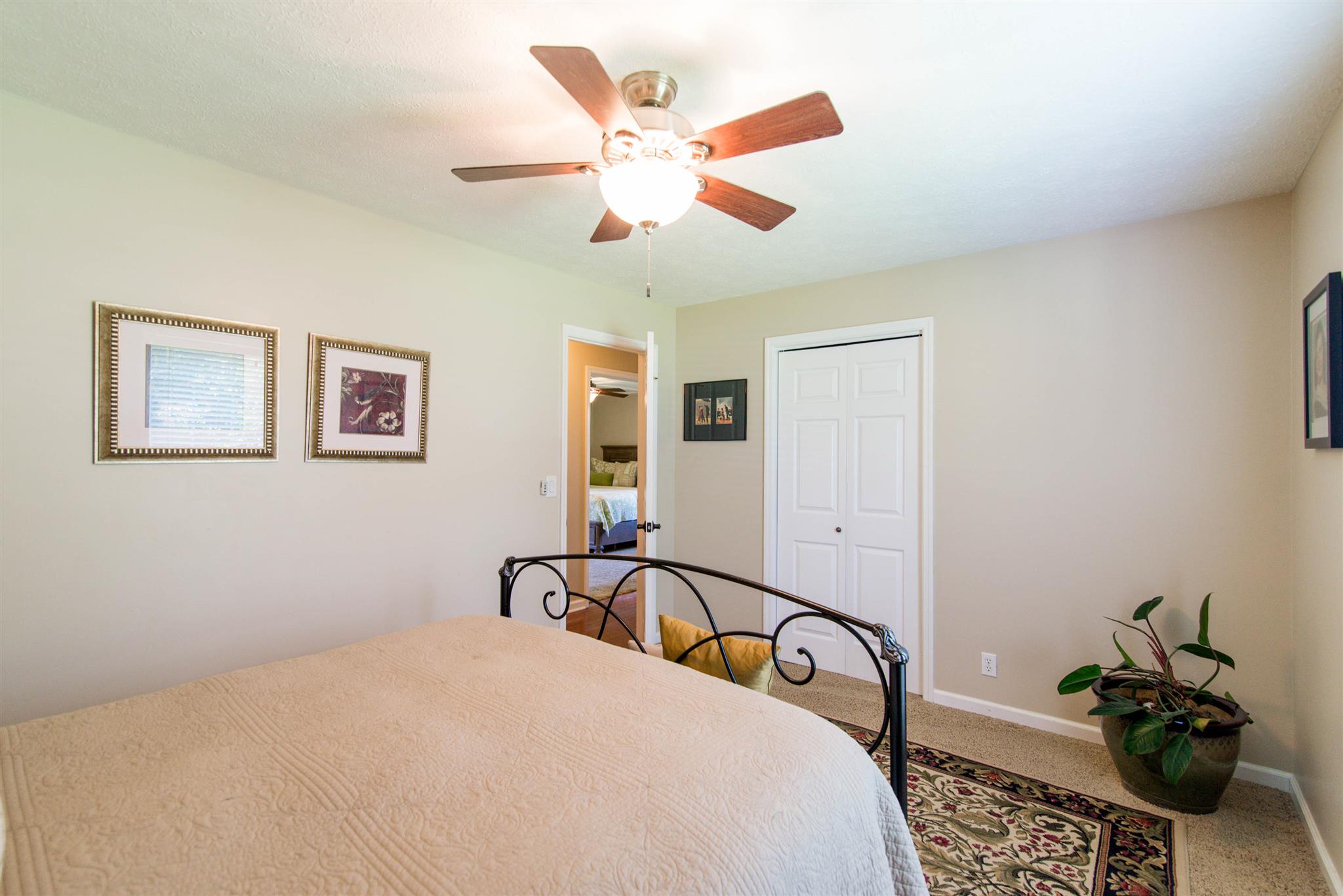 210 Independence Street Springfield, TN 37172 - Photo 20 of 30 a bedroom with a bed dresser and a window